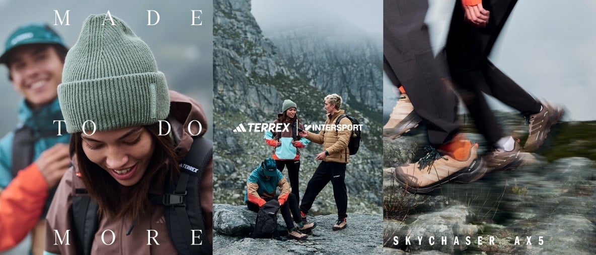 Menschen beim Wandern in den Bergen mit Ausrüstung von Adidas Terrex.
