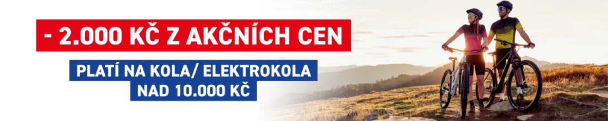 Muž a žena na horách drží kola Genesis Impact Carbon. Na levo je nadpis akce: - 2000 Kč z akční ceny. Dole jsou pak loga značek Genesis, KTM, Husqvarna a Scott.