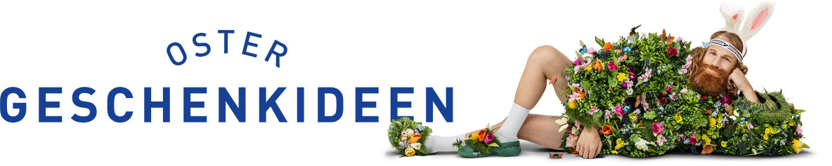 Liegender Mann mit Bart, Hasenohren und Blumenanzug wirbt für Ostergeschenke.