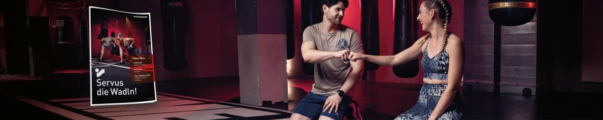 Titelseite des INTERSPORT Fitness-Special. Im Hintergrund das Bild von einer Frau und einem Mann in einem Fitnessstudio.