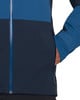 Detail einer Jacke mit dunkelblauen und blauen Partien und Ärmel.