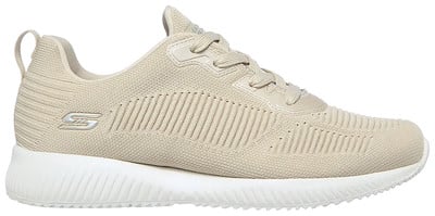 Bézs textil női sportcipő fehér talppal és Skechers logóval. Bézs textil női sportcipő fehér talppal és Skechers logóval.