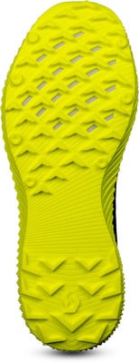 Gelbe Laufschuhsohle mit ausgeprägtem Profil für gute Traktion. Gelbe Laufschuhsohle mit ausgeprägtem Profil für gute Traktion.
