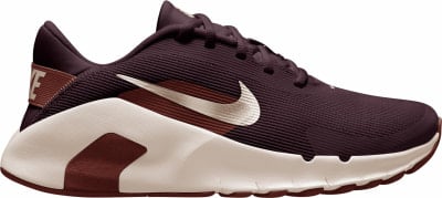 Seitenansicht eines burgunderfarbenen Nike-Laufschuhs mit beiger Sohle.