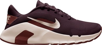 Pohled z boku na vínové běžecké boty Nike s béžovou podrážkou.