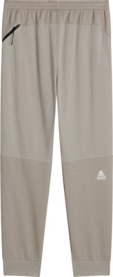 Herren-Jogginghose in Beige mit modernem Muster und Reißverschlusstasche. Herren-Jogginghose in Beige mit modernem Muster und Reißverschlusstasche.
