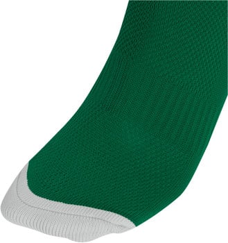 Grüne Socke mit weißem Bund an der Spitze.