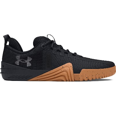 Schwarzer Under Armour Trainingsschuh mit Gummisohle und Under Armour Logo. Schwarzer Under Armour Trainingsschuh mit Gummisohle und Under Armour Logo.