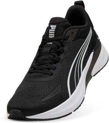 Schwarzer Puma Laufschuh mit weißem Streifenlogo und weißer Sohle. Schwarzer Puma Laufschuh mit weißem Streifenlogo und weißer Sohle.