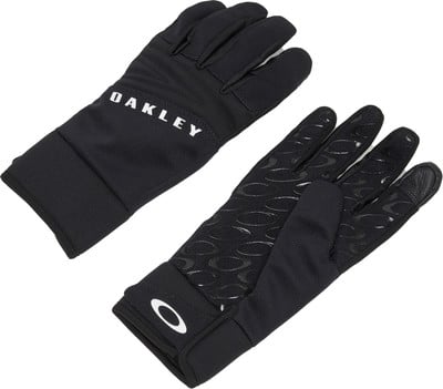 Schwarze Oakley-Handschuhe mit Logo auf dem Handrücken und griffigen Elementen an der Handfläche. Schwarze Oakley-Handschuhe mit Logo auf dem Handrücken und griffigen Elementen an der Handfläche.