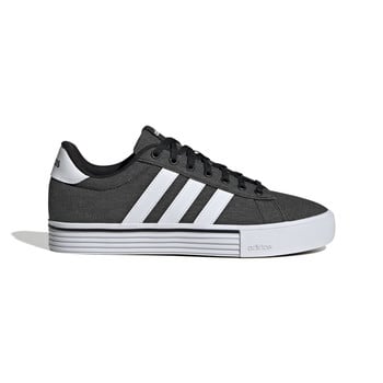 Černé tenisky Adidas s bílými pruhy a bílou podrážkou.