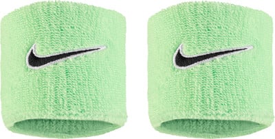 Zwei hellgrüne Stoffarmbänder mit Nike-Logo. Zwei hellgrüne Stoffarmbänder mit Nike-Logo.