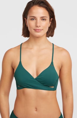 Das Model trägt einen dunkelgrünen Badeanzug-Top mit V-Ausschnitt. Das Model trägt einen dunkelgrünen Badeanzug-Top mit V-Ausschnitt.