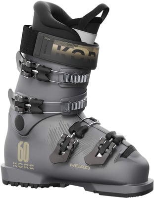 Grauer HEAD KORE 60 Skischuh mit schwarzem Innenschuh und goldenen Details. Grauer HEAD KORE 60 Skischuh mit schwarzem Innenschuh und goldenen Details.