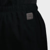 Schwarze Nike Sporthose mit Dri-Fit Logo und Text.