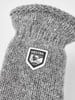 Graue Strickhandschuhe mit Hestra-Logo und Jahreszahl 1936.