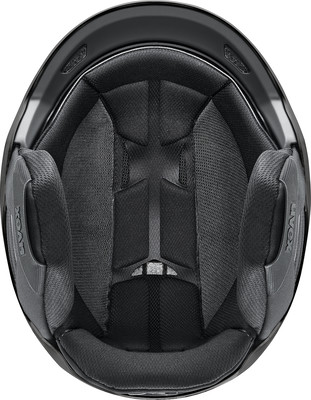 Die Innenseite eines schwarzen Motorradhelms mit Polsterung. Die Innenseite eines schwarzen Motorradhelms mit Polsterung.