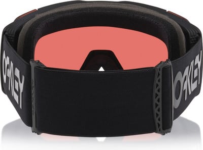 Schwarze Oakley Skibrille mit roter Linse und weißem Logo auf dem Band. Schwarze Oakley Skibrille mit roter Linse und weißem Logo auf dem Band.