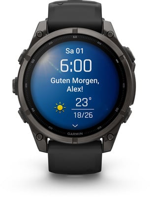 Eine Smartwatch zeigt 6:00 Uhr, Sa 01 und das Wetter an. Eine Smartwatch zeigt 6:00 Uhr, Sa 01 und das Wetter an.