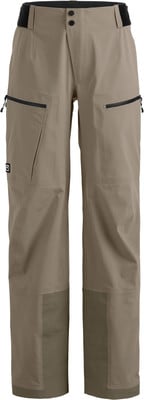 Braune Outdoorhose mit schwarzem Bund und Reißverschlusstaschen. Braune Outdoorhose mit schwarzem Bund und Reißverschlusstaschen.
