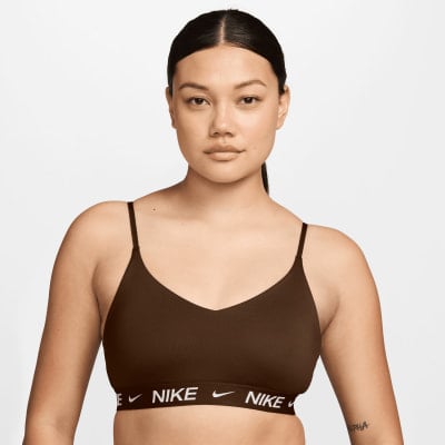 Damen-Sport-BH von Nike in Braun mit Logo auf dem Bund. Damen-Sport-BH von Nike in Braun mit Logo auf dem Bund.