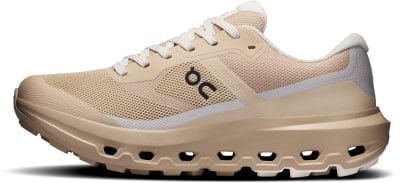 Sandfarbener Laufschuh mit weißen Schnürsenkeln und schwarzem ON-Logo. Sandfarbener Laufschuh mit weißen Schnürsenkeln und schwarzem ON-Logo.