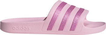 Ein pinker Adidas-Schuh mit glitzernden Streifen.