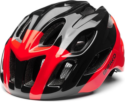 Černá a červená cyklistická helma s mnoha větracími otvory. Černá a červená cyklistická helma s mnoha větracími otvory.