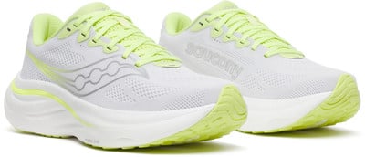 Weiße Damen-Laufschuhe von Saucony mit hellgrünen Akzenten. Weiße Damen-Laufschuhe von Saucony mit hellgrünen Akzenten.