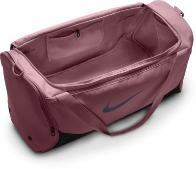 Eine rosafarbene Nike Sporttasche mit Logo und Innentaschen. Eine rosafarbene Nike Sporttasche mit Logo und Innentaschen.