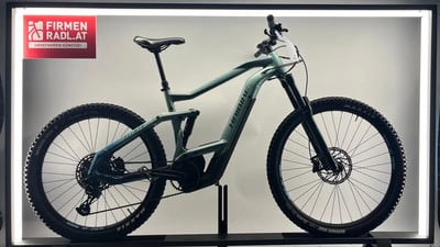 Ein grünes Haibike E-Bike mit Federung und Haibike-Schriftzug.