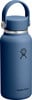 Blaue Hydro Flask Flasche mit Griff und Logo.