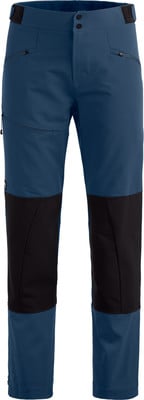 Blaue Outdoorhose mit schwarzen Einsätzen und Reißverschlusstaschen. Blaue Outdoorhose mit schwarzen Einsätzen und Reißverschlusstaschen.