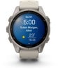 Eine Garmin-Smartwatch zeigt 6:00 Uhr, Datum und Wetter an.