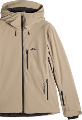 Eine beige Jacke mit schwarzen Reißverschlüssen und J.Lindeberg-Logo. Eine beige Jacke mit schwarzen Reißverschlüssen und J.Lindeberg-Logo.