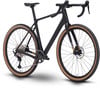 Schwarzes Gravelbike mit braunen Reifen und schwarzem Rahmen.