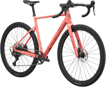 Ein rosafarbenes Scott Gravelbike mit schwarzen Rädern und schwarzem Sattel.