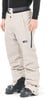 Beige Skihose mit Picture-Logo und schwarzen Skischuhen.