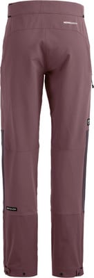Damen-Outdoorhose in Lila mit dunkleren Seitenpaneelen und Logo. Damen-Outdoorhose in Lila mit dunkleren Seitenpaneelen und Logo.