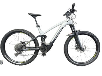 Ein Genesis E-Mountainbike mit Federung und Scheibenbremsen.