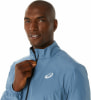 Asics CORE JACKET běžecká bunda