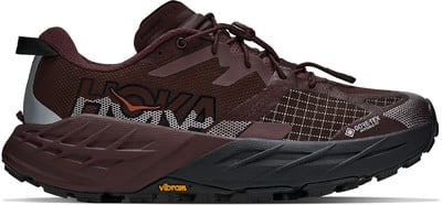 Brauner Hoka-Laufschuh mit Markenlogo und Gore-Tex-Technologie. Brauner Hoka-Laufschuh mit Markenlogo und Gore-Tex-Technologie.