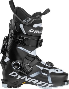 Ein schwarzer Dynafit Skischuh mit weißen und grauen Details und mehreren Schnallen.