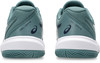 Grüne ASICS GEL-GAME Tennisschuhe mit weißer Sohle und Logo.