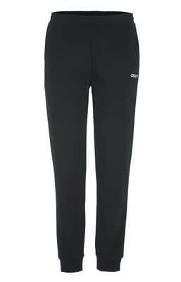 Schwarze Trainingshose mit CRAFT-Logo auf dem linken Bein. Schwarze Trainingshose mit CRAFT-Logo auf dem linken Bein.