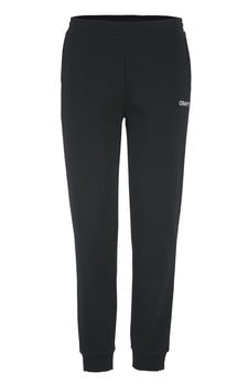 Schwarze Trainingshose mit CRAFT-Logo auf dem linken Bein.