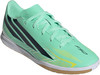 Damenfußballschuh Adidas F50 in Mintgrün mit schwarzen Streifen und gelben Details.