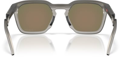 Graue Sonnenbrille mit braunen Spiegellinsen und transparentem Rahmen. Graue Sonnenbrille mit braunen Spiegellinsen und transparentem Rahmen.