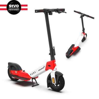 Zwei rot-weiße Roller mit Ständer und McLaren-Logo. Zwei rot-weiße Roller mit Ständer und McLaren-Logo.