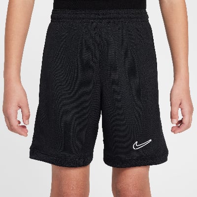 Schwarze Sporthose mit Nike-Logo auf dem Bein.